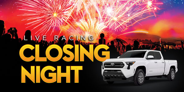 A white pickup truck in front of a crowd watching fireworks, with “LIVE RACING CLOSING NIGHT” in bold yellow text on a colorful night sky background.