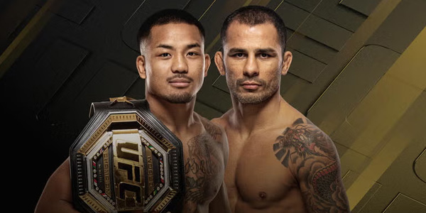 Two male MMA fighters stand side by side; one holds a UFC championship belt. Both are shirtless with visible tattoos, posing against a dark, geometric background.
