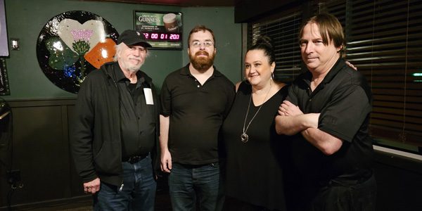 A group of people standing next to each other.