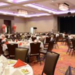 A large room with many tables and chairs