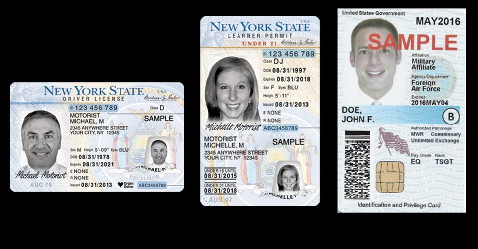 A group of three new york state drivers licenses.