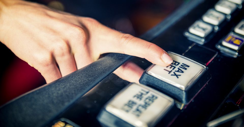 A person is using the machine to change their card.